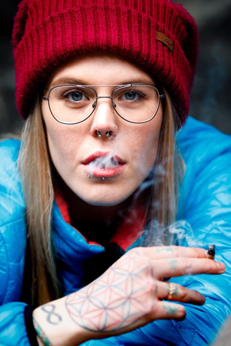 Cannabis Lifestyle Photography: Cute Girl Smoking Cannabis in Nature