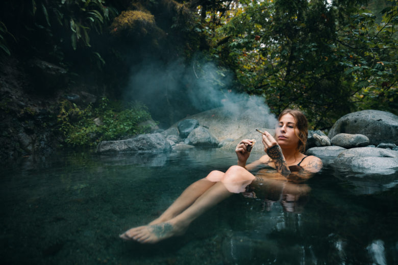 Cannabis Lifestyle Photography: Cute Girl Smoking Cannabis in Hot Springs